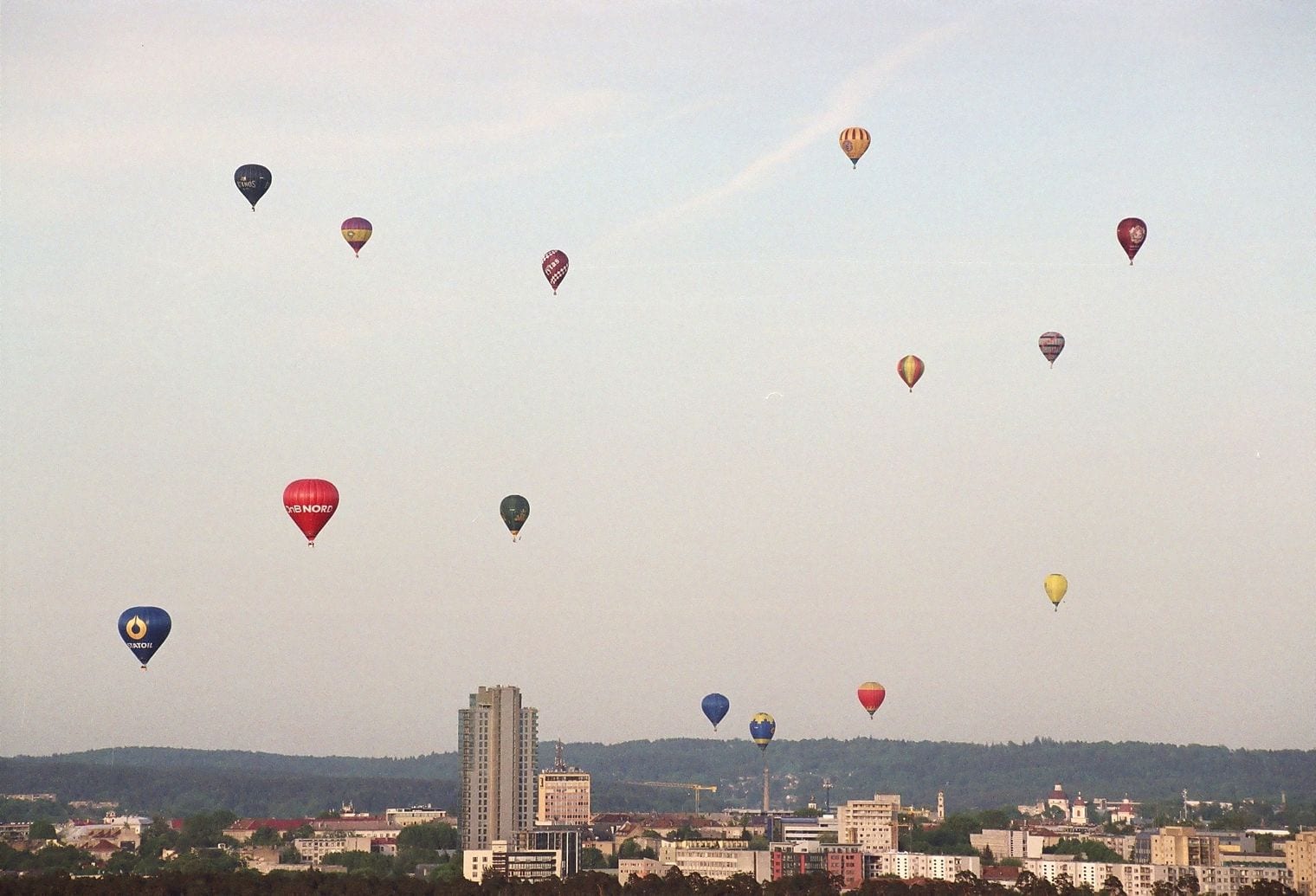 Balloons Drift Over the Old Town in Summer, Lithuania