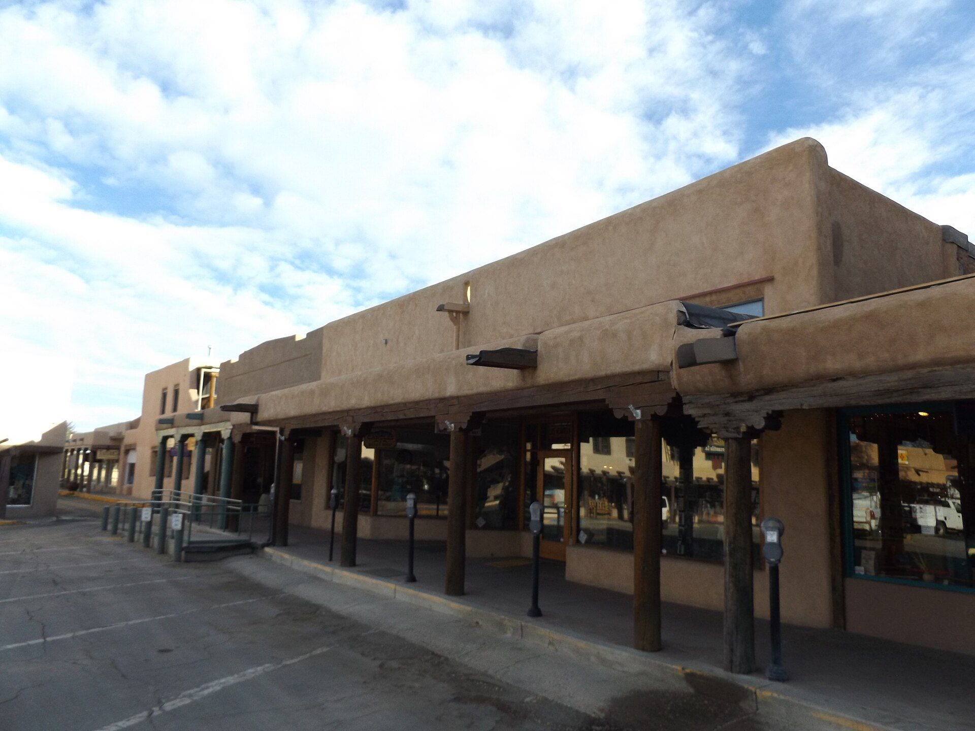 Adobe shops and covered portals near the plaza in Taos, New Mexico