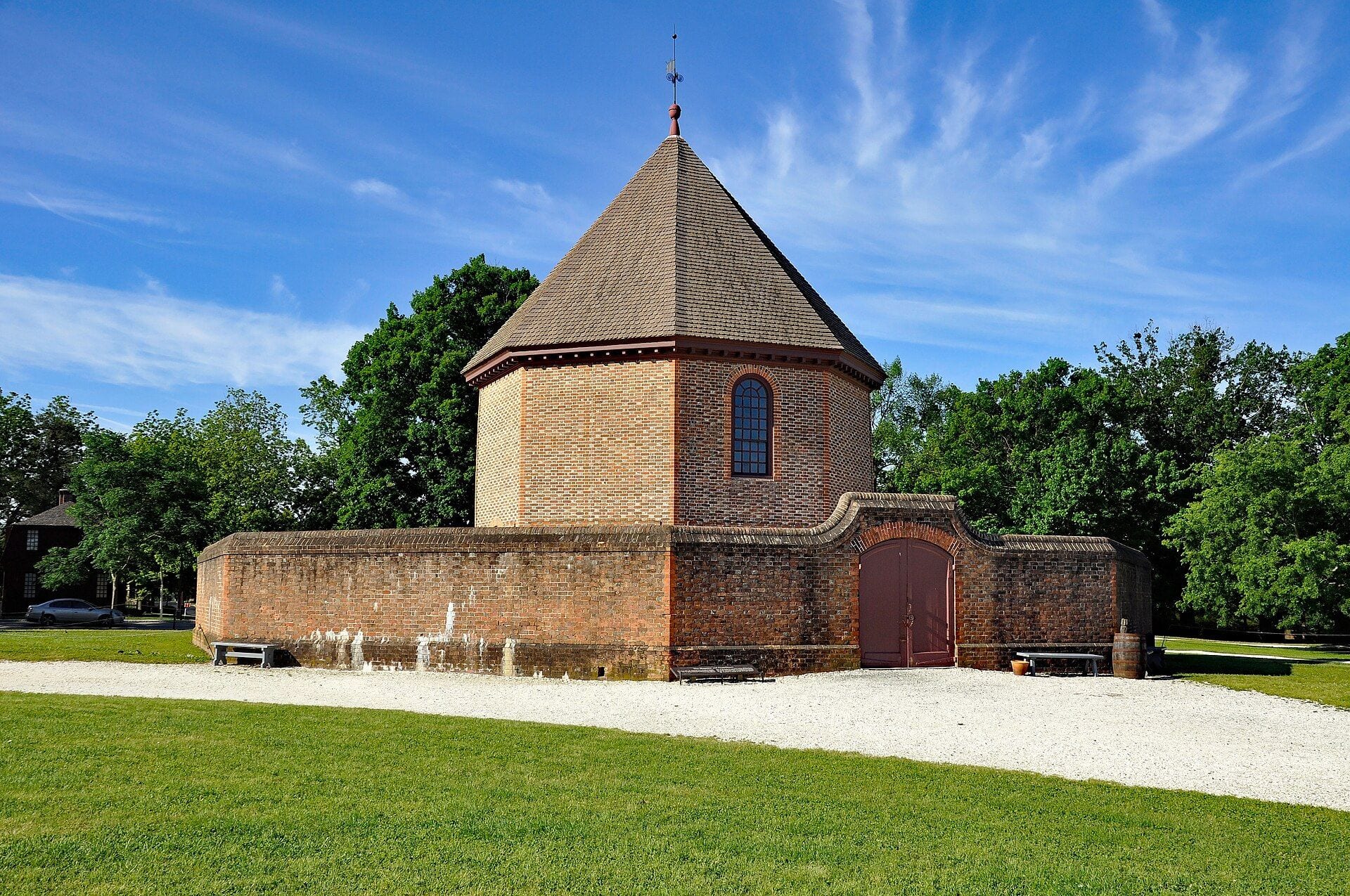 The octagonal brick Powder Magazine on its lawn in Colonial Williamsburg, Virginia