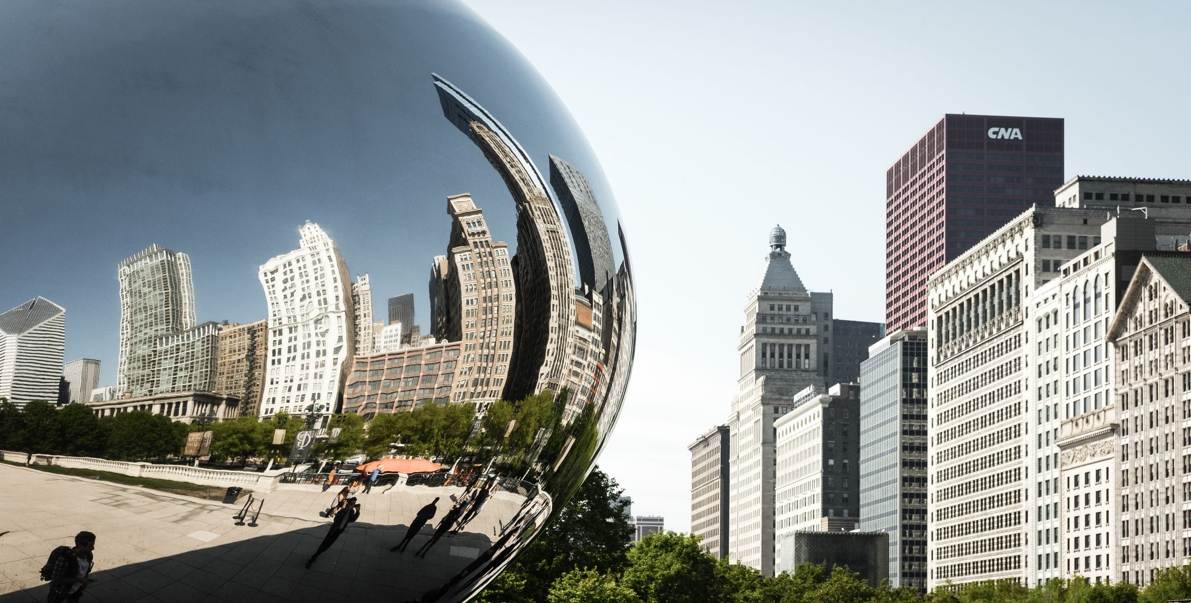 Cloud Gate, the mirrored Chicago Bean sculpture in Millennium Park, reflecting the downtown skyline