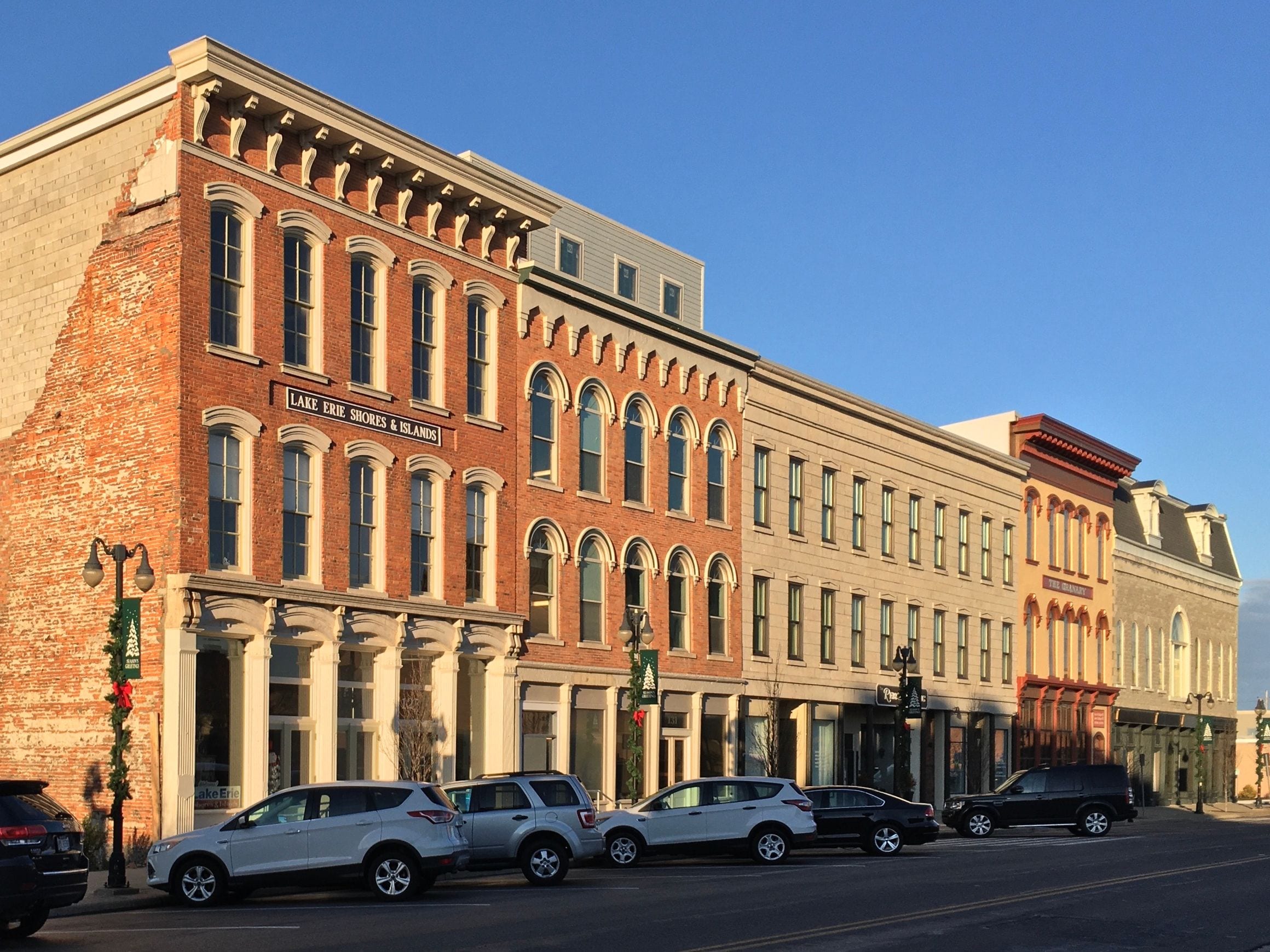 Restored nineteenth-century brick and stone commercial buildings along East Water Street in downtown Sandusky, Ohio